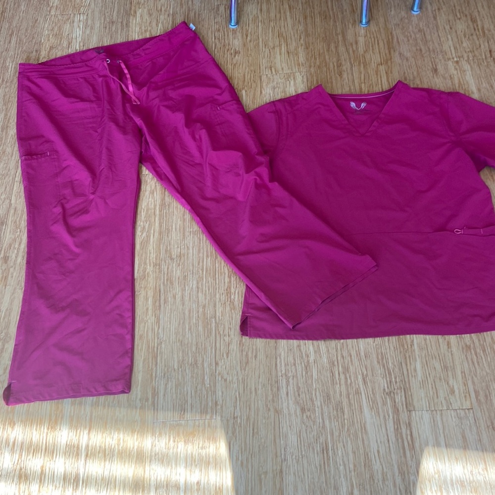 Smitten brand scrubs light weight fabric water resistant